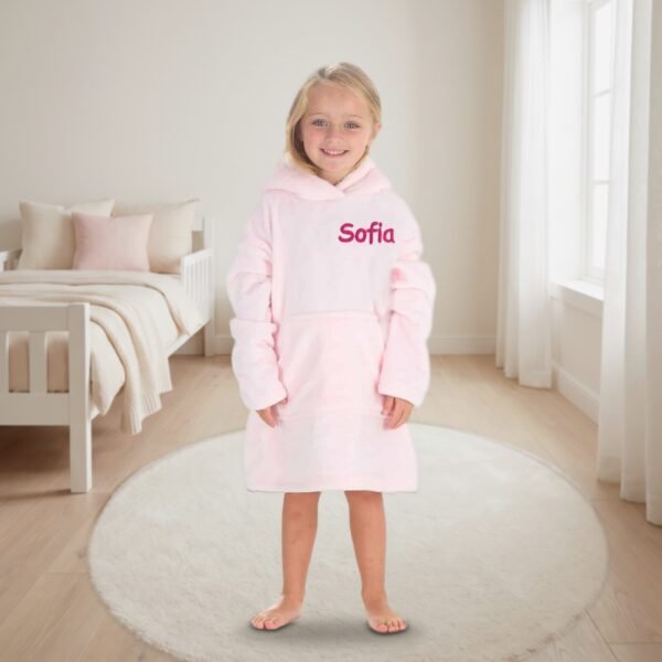 Personalised toddler fleece hoodie blanket in pink with bear ears, embroidered with a name