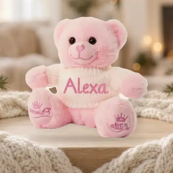Pink personalised teddy bear in a jumper embroidered with Alexa