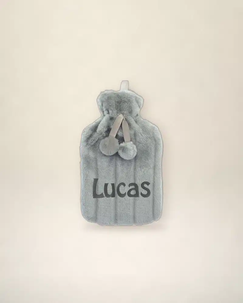 Personalised fluffy hot water bottle cover with an embroidered name