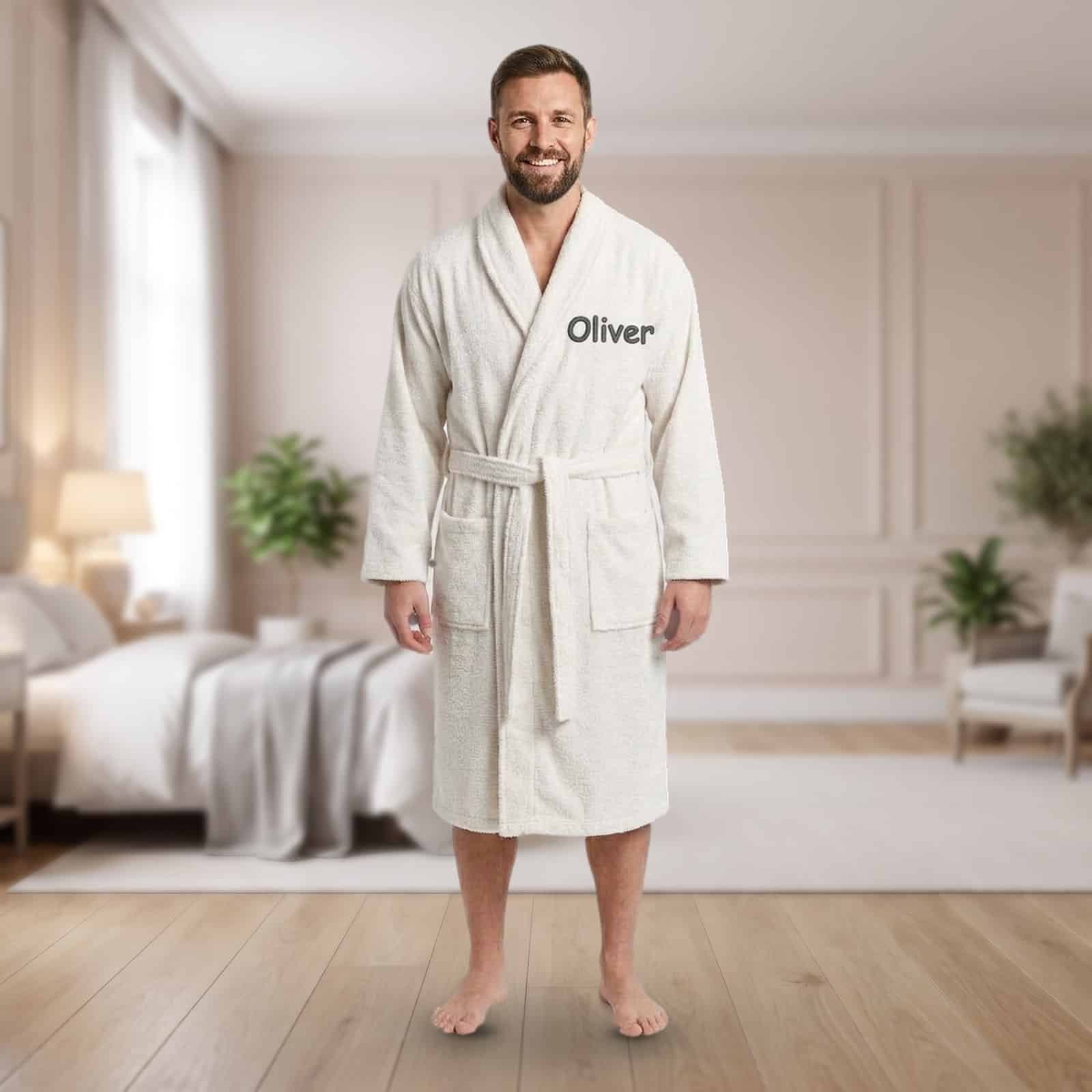 Personalised white adult towelling robe with a shawl collar and a name embroidered on the chest